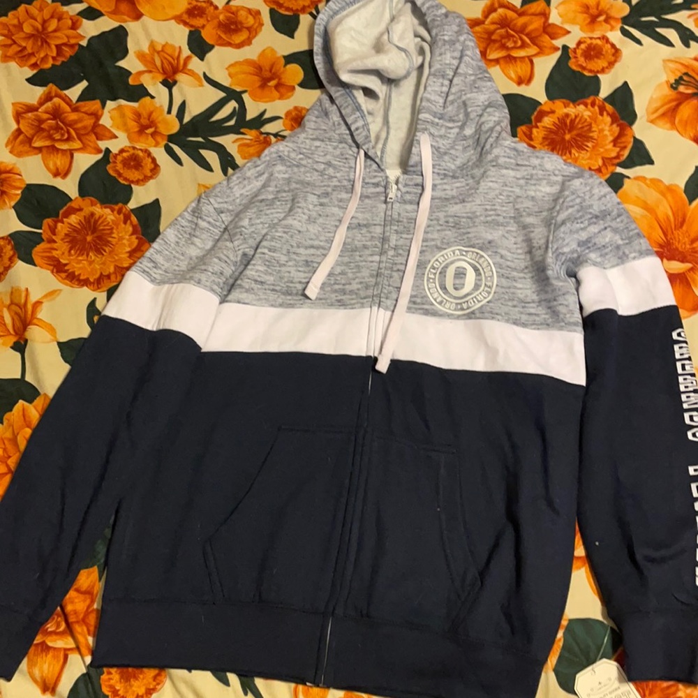 Brand new and never worn hoodie. Size medium.